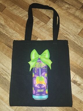 Black Tote Bag with Purple & Green Alani Witches Brew Graphic. 13x15